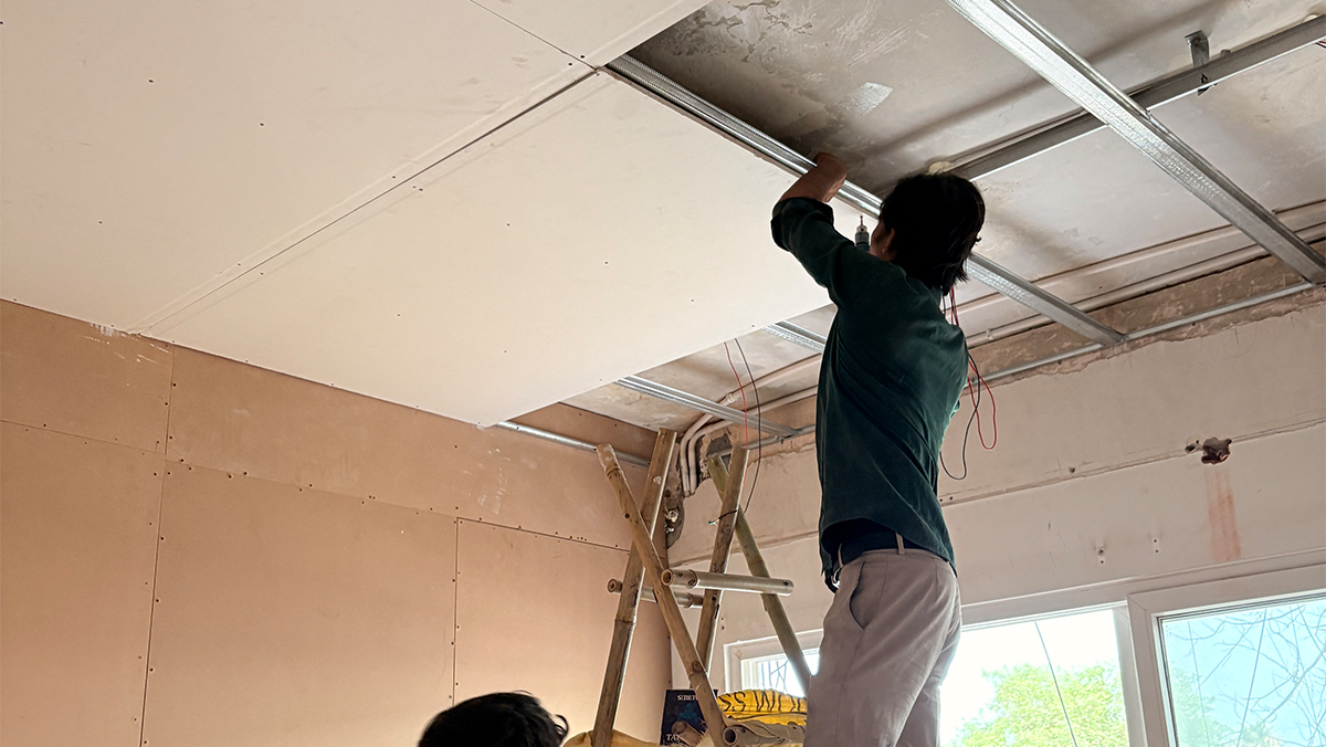 Premium liquor store interior with illuminated racks and zoned layout